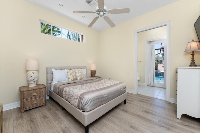 26 Saint Croix Way, Englewood, FL 34223 - bedroom with light wood-style flooring, visible vents, and multiple windows