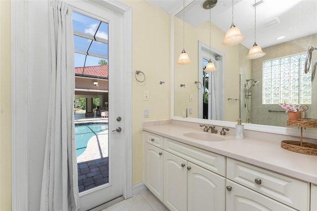 26 Saint Croix Way, Englewood, FL 34223 - bathroom featuring plenty of natural light, tile patterned flooring, and vanity