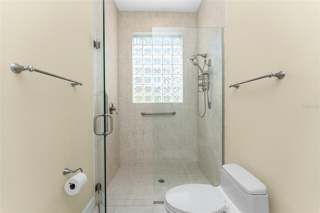 26 Saint Croix Way, Englewood, FL 34223 - bathroom with a shower stall and toilet