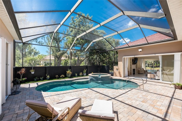 26 Saint Croix Way, Englewood, FL 34223 - view of pool with a patio area, glass enclosure, and a pool with connected hot tub