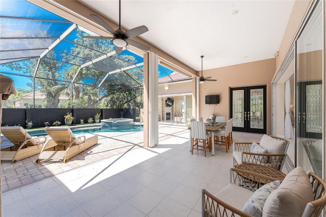 26 Saint Croix Way, Englewood, FL 34223 - view of patio / terrace with ceiling fan, an outdoor hangout area, french doors, and a pool with connected hot tub