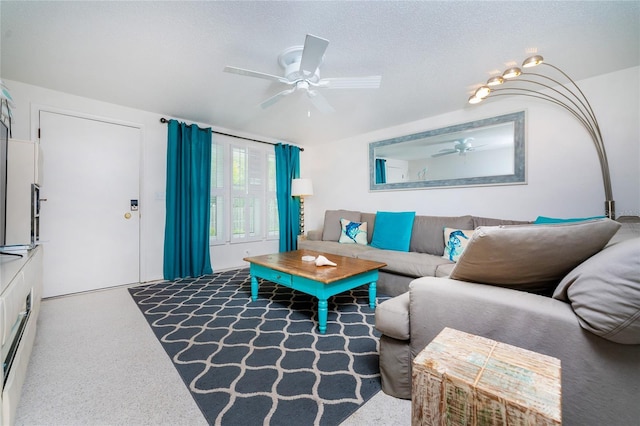 living area with ceiling fan