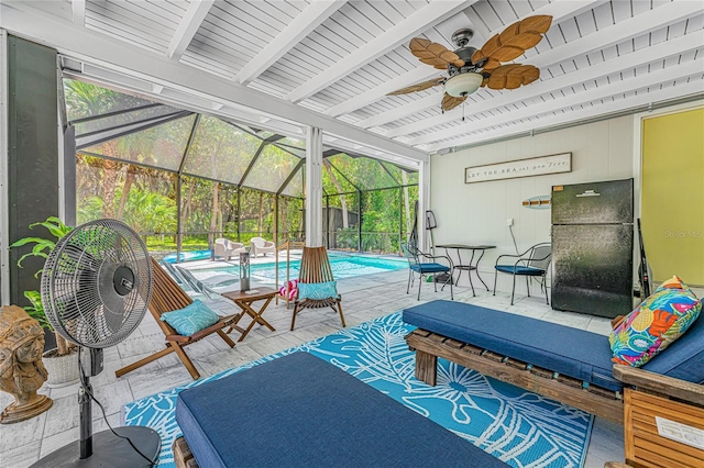 view of patio with an outdoor pool, ceiling fan, glass enclosure, and an outdoor hangout area