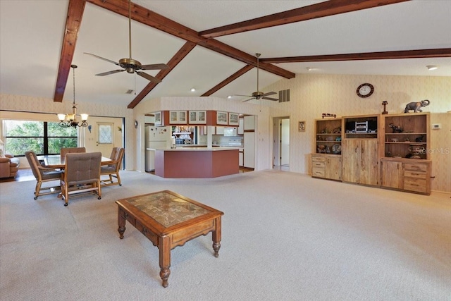 6305 Shalimar St, Port Charlotte, FL 33981 - living room featuring light carpet, a ceiling fan, a chandelier, and wallpapered walls
