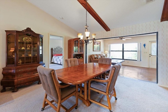 6305 Shalimar St, Port Charlotte, FL 33981 - carpeted dining room with a chandelier, wallpapered walls, and ceiling fan