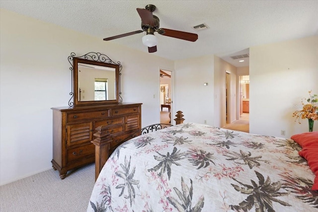 6305 Shalimar St, Port Charlotte, FL 33981 - bedroom with light carpet, a ceiling fan, and a textured ceiling