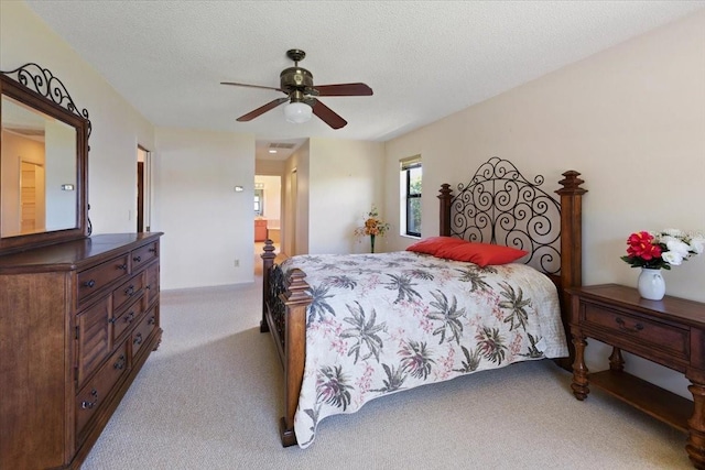 6305 Shalimar St, Port Charlotte, FL 33981 - carpeted bedroom with ceiling fan and a textured ceiling
