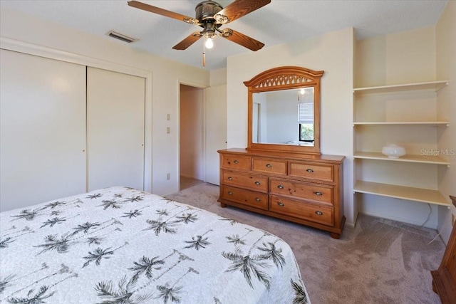 6305 Shalimar St, Port Charlotte, FL 33981 - carpeted bedroom featuring a closet and a ceiling fan