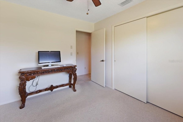 6305 Shalimar St, Port Charlotte, FL 33981 - office with light carpet and a ceiling fan