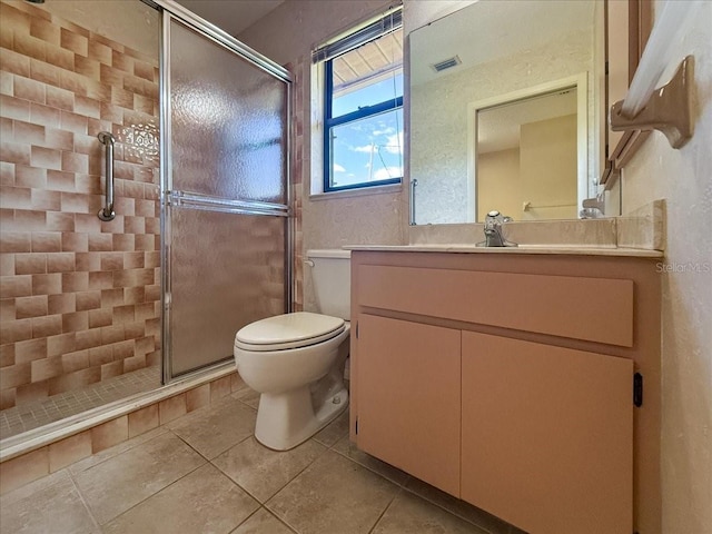 6305 Shalimar St, Port Charlotte, FL 33981 - bathroom with a stall shower, vanity, tile patterned floors, and a textured wall