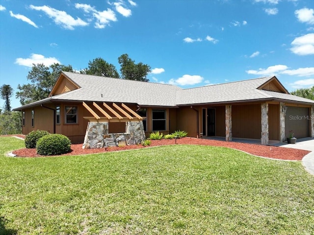 6305 Shalimar St, Port Charlotte, FL 33981 - view of front of property with an attached garage, a front yard, concrete driveway, and stone siding