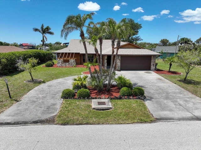 6305 Shalimar St, Port Charlotte, FL 33981 - ranch-style house featuring concrete driveway, an attached garage, and a front lawn