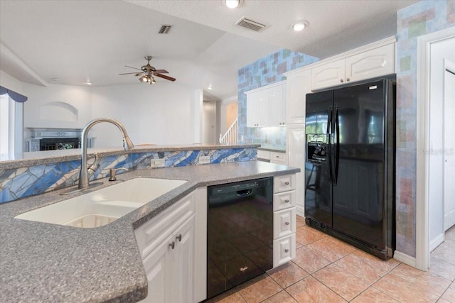 kitchen with visible vents, a ceiling fan, a sink, black appliances, and white cabinetry