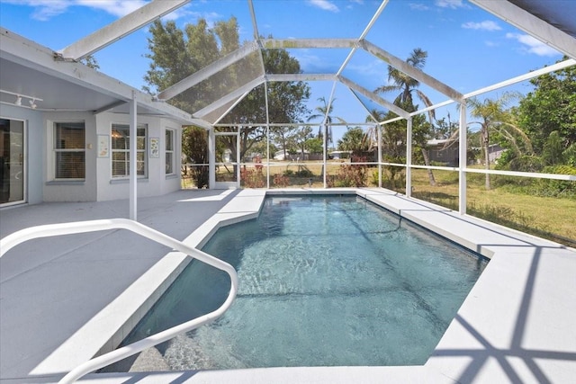 pool with a patio area