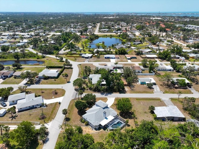 aerial view featuring a residential view and a water view
