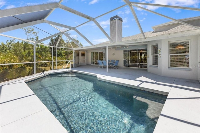 pool featuring a patio area and a lanai