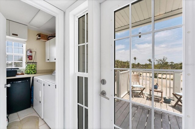 7554 Palm Island Dr S Unit 1822, Placida, FL 33946 - clothes washing area featuring independent washer and dryer and cabinet space