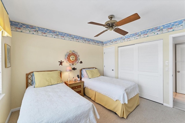 7554 Palm Island Dr S Unit 1822, Placida, FL 33946 - bedroom with a closet, baseboards, a ceiling fan, and carpet floors