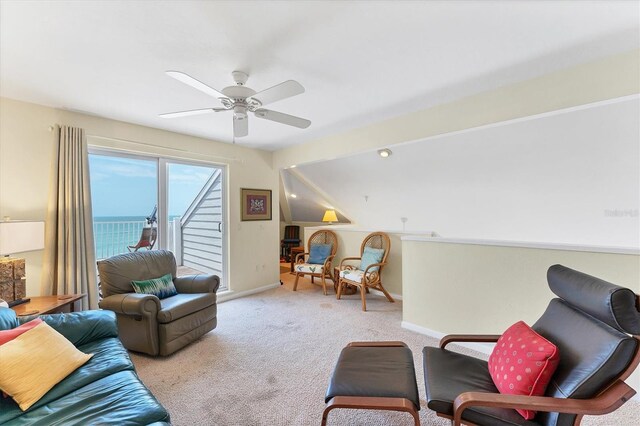 7554 Palm Island Dr S Unit 1822, Placida, FL 33946 - living area featuring carpet flooring, baseboards, and a ceiling fan