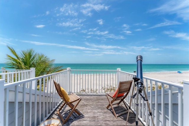 7554 Palm Island Dr S Unit 1822, Placida, FL 33946 - wooden deck featuring a view of the beach and a water view