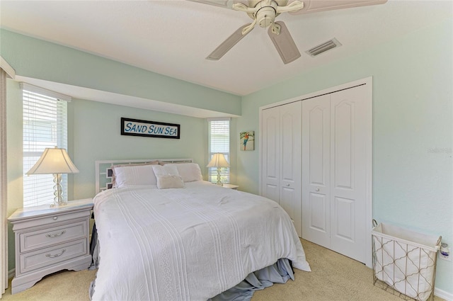 68 Long Meadow Ln, Rotonda West, FL 33947 - bedroom featuring carpet floors, a ceiling fan, visible vents, and a closet