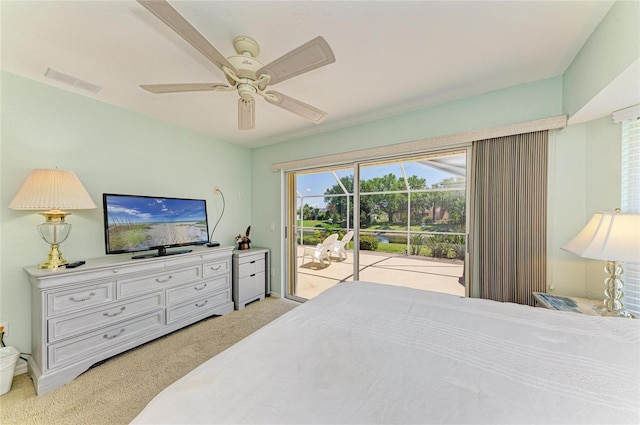 68 Long Meadow Ln, Rotonda West, FL 33947 - bedroom with a ceiling fan, light carpet, baseboards, access to exterior, and visible vents
