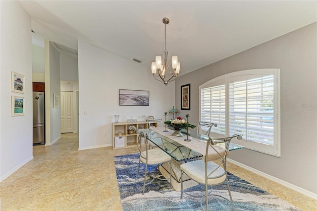 68 Long Meadow Ln, Rotonda West, FL 33947 - dining room with vaulted ceiling, light tile patterned flooring, a chandelier, baseboards, and visible vents