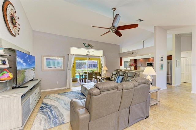 68 Long Meadow Ln, Rotonda West, FL 33947 - living area featuring light tile patterned flooring, baseboards, visible vents, ceiling fan, and high vaulted ceiling