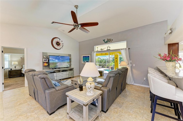 68 Long Meadow Ln, Rotonda West, FL 33947 - living area with high vaulted ceiling, ceiling fan, baseboards, and light tile patterned floors