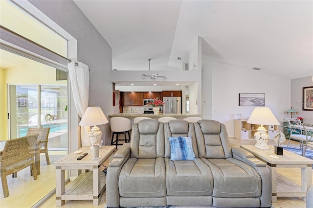 68 Long Meadow Ln, Rotonda West, FL 33947 - living room with visible vents and high vaulted ceiling