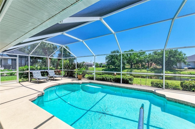 68 Long Meadow Ln, Rotonda West, FL 33947 - outdoor pool featuring a lanai, a water view, and a patio