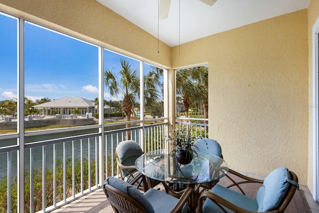 8500 Amberjack Cir Unit 102, Englewood, FL 34224 - sunroom / solarium featuring a water view and ceiling fan