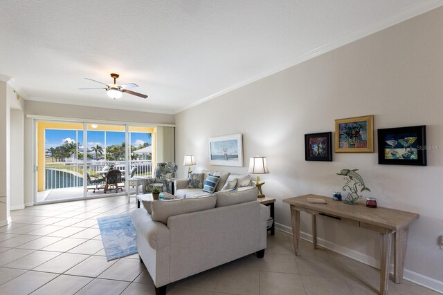 8500 Amberjack Cir Unit 102, Englewood, FL 34224 - living area featuring ceiling fan, baseboards, crown molding, and light tile patterned floors