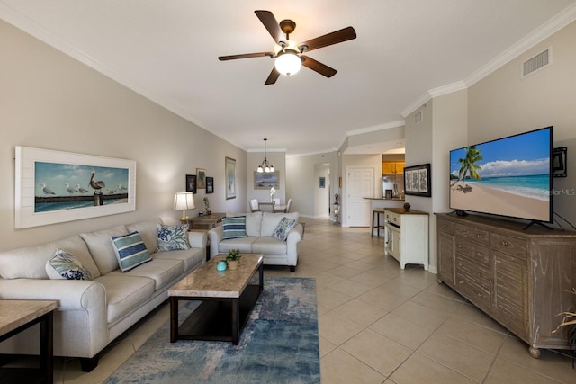 8500 Amberjack Cir Unit 102, Englewood, FL 34224 - living room with ceiling fan, crown molding, visible vents, and light tile patterned floors
