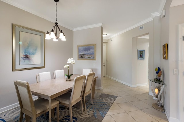 8500 Amberjack Cir Unit 102, Englewood, FL 34224 - dining area with visible vents, ornamental molding, light tile patterned floors, baseboards, and a notable chandelier