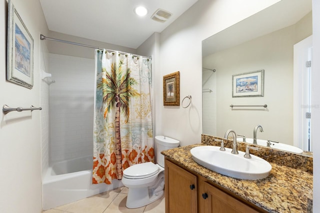 8500 Amberjack Cir Unit 102, Englewood, FL 34224 - bathroom featuring vanity, shower / tub combo, toilet, tile patterned flooring, and visible vents