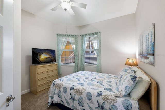 8500 Amberjack Cir Unit 102, Englewood, FL 34224 - carpeted bedroom featuring baseboards and ceiling fan
