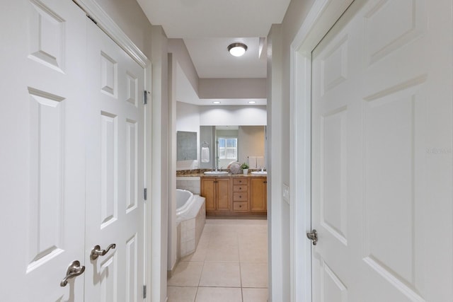 8500 Amberjack Cir Unit 102, Englewood, FL 34224 - full bath featuring a garden tub, tile patterned floors, and vanity