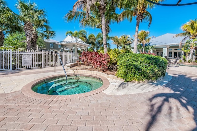 8500 Amberjack Cir Unit 102, Englewood, FL 34224 - view of pool with fence and a hot tub