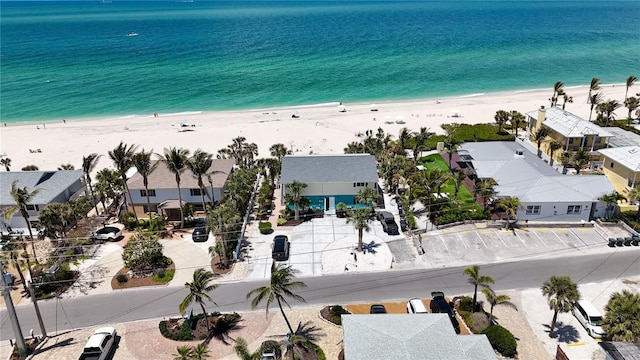 aerial view with a beach view and a water view