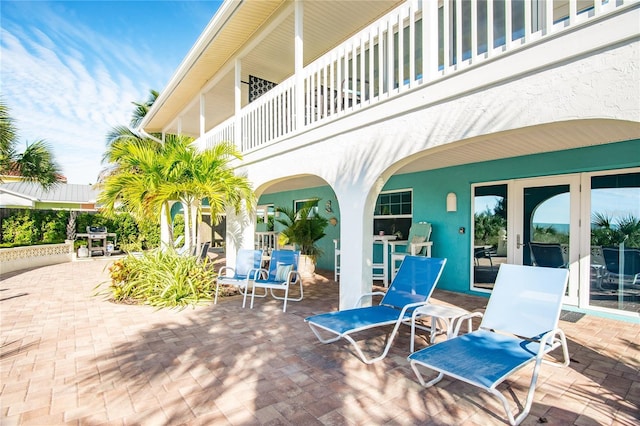 view of patio / terrace featuring a balcony