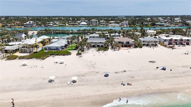 bird's eye view with a water view and a residential view