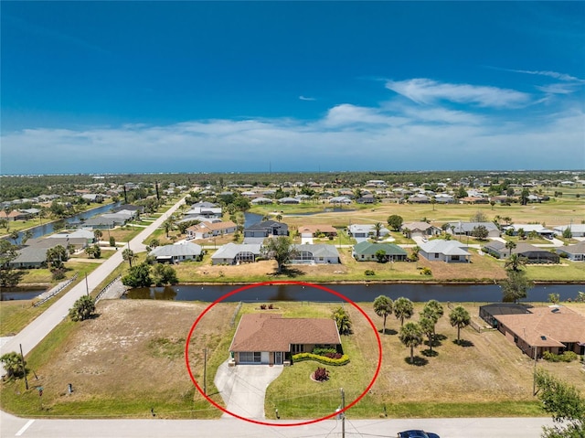 39 Bunker Pl, Rotonda West, FL 33947 - birds eye view of property featuring a residential view and a water view