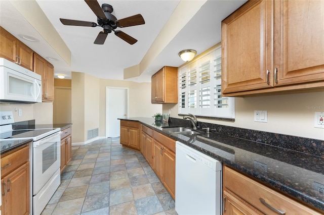 39 Bunker Pl, Rotonda West, FL 33947 - kitchen with a sink, visible vents, stone finish floor, white appliances, and ceiling fan