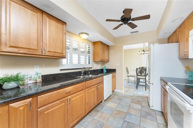 39 Bunker Pl, Rotonda West, FL 33947 - kitchen featuring a sink, visible vents, baseboards, ceiling fan with notable chandelier, and white appliances