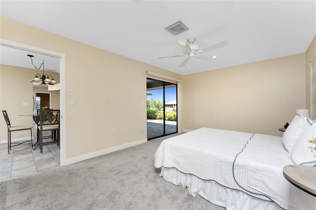 39 Bunker Pl, Rotonda West, FL 33947 - bedroom with access to exterior, visible vents, baseboards, light colored carpet, and ceiling fan with notable chandelier