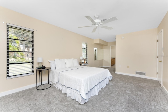 39 Bunker Pl, Rotonda West, FL 33947 - bedroom featuring baseboards, visible vents, and carpet floors