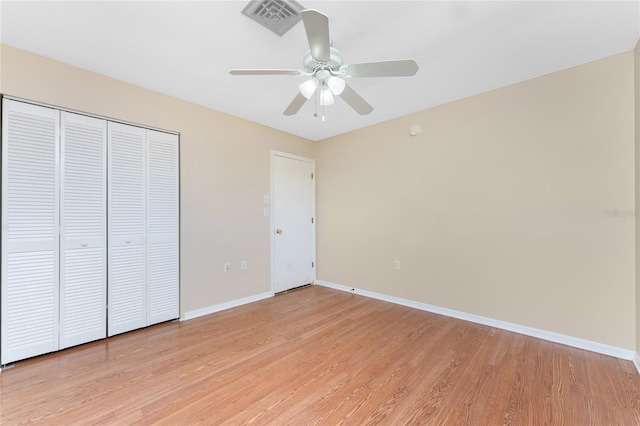 39 Bunker Pl, Rotonda West, FL 33947 - unfurnished bedroom featuring visible vents, light wood-style flooring, baseboards, and a closet
