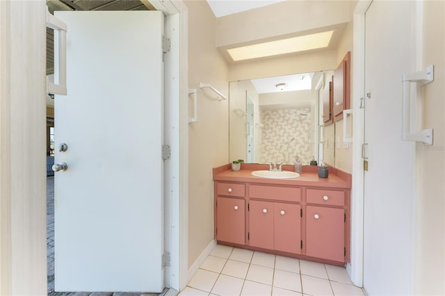 39 Bunker Pl, Rotonda West, FL 33947 - bathroom with vanity, tile patterned floors, and a skylight