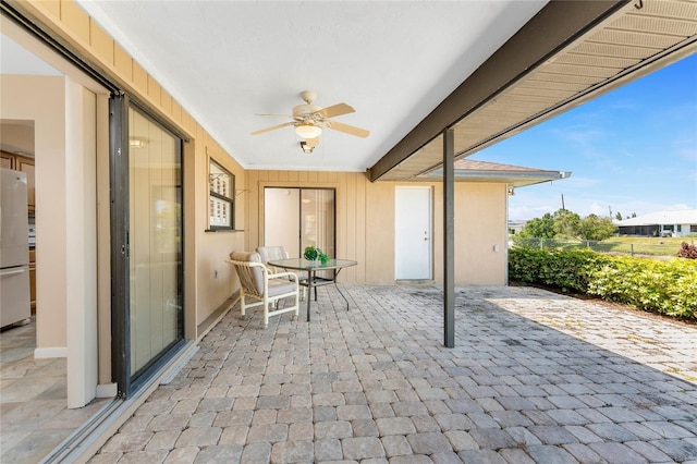 39 Bunker Pl, Rotonda West, FL 33947 - view of patio featuring outdoor dining space and ceiling fan